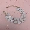 Witte coin armband